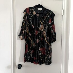 Shirt dress with metallic embellishments lines in sheer material